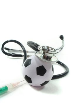 Stethoscope with football and syringe clipart