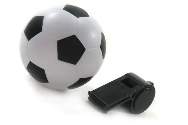 Voetbal met zwarte fluitje — Stockfoto