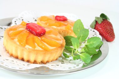 Apricot tart with lemon balm clipart