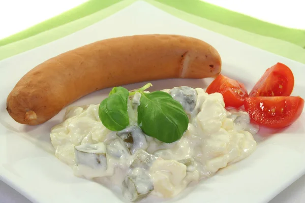 Bockwurst com salada de batata — Fotografia de Stock