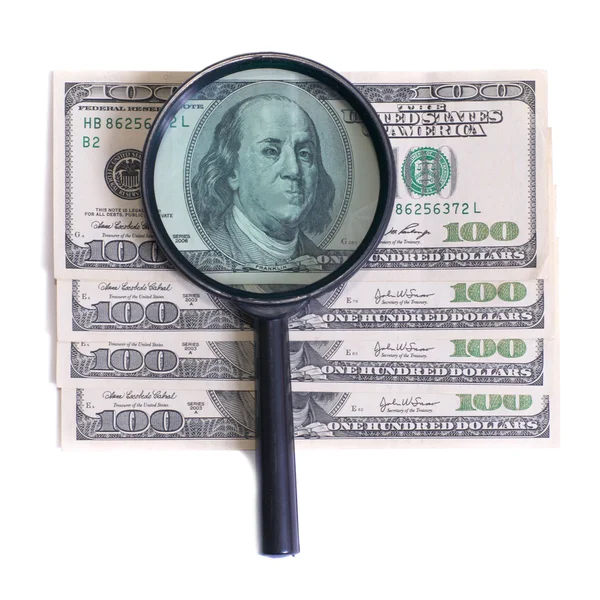 Magnifier with dollars — Stock Photo, Image