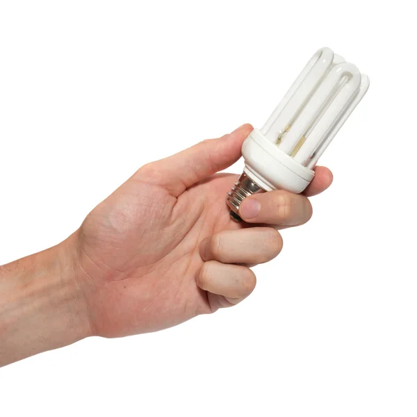 stock image Economy lamp in a hand