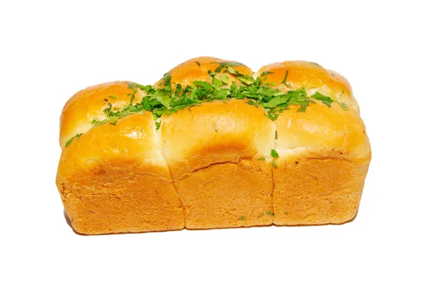Golden fresh bread with greens — Stock Photo, Image