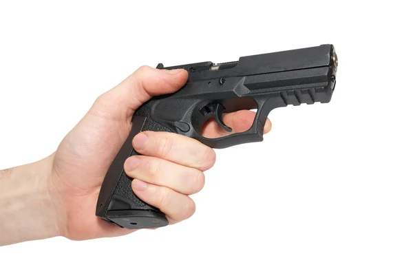 Pistola preta em uma mão — Fotografia de Stock