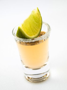 Shot of tequila and lime clipart