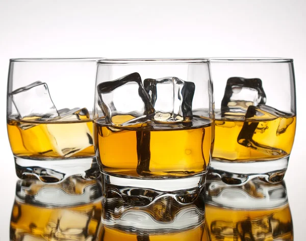 Three glasses of whskey — Stock Photo, Image