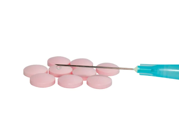 Syringe and tablets — Stock Photo, Image