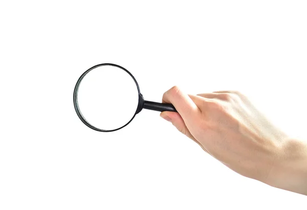 Magnifier in hand — Stock Photo, Image