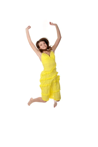 Young smiling woman jumping. — Stock Photo, Image