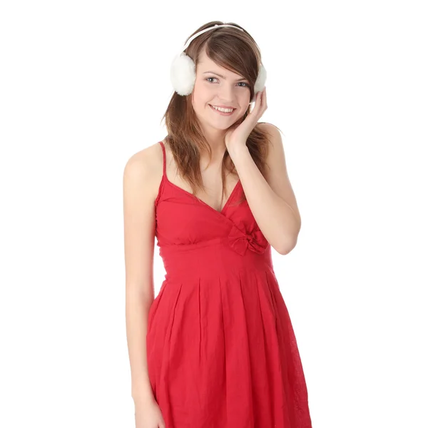 Teen flicka bär vita hörselkåpan — Stockfoto