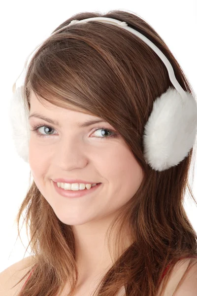 Söt flicka bär vita hörselkåpan — Stockfoto