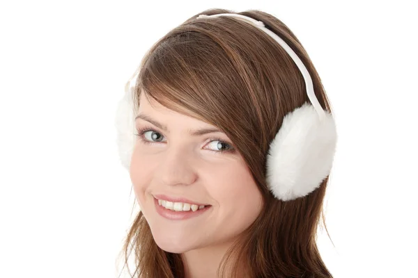 Söt tonåring flicka klädd i vit hörselkåpan — Stockfoto