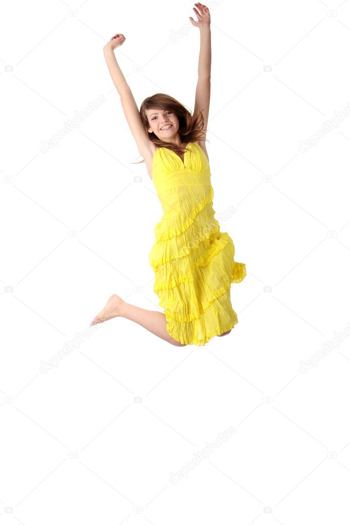 Young smiling woman jumping.