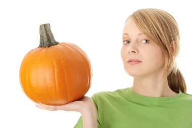 Young woman holding orange pumpkin clipart