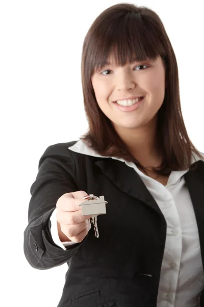 Beautiful woman holding keys and moneys — Stock Photo, Image