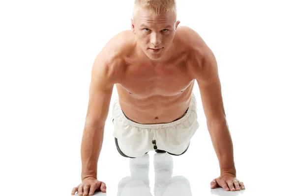 Sexy muscular man exercising — Stock Photo, Image