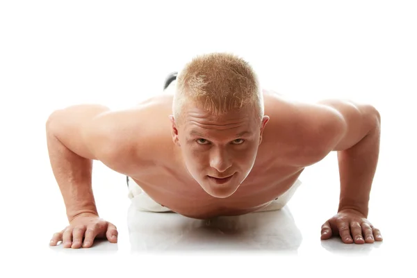Sexy muscular man exercising — Stock Photo, Image