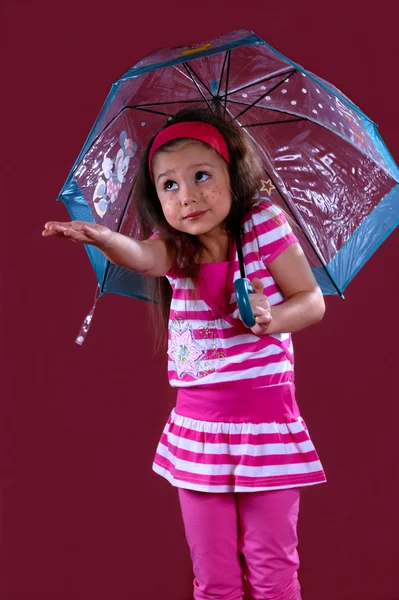Menina com um guarda-chuva — Fotografia de Stock