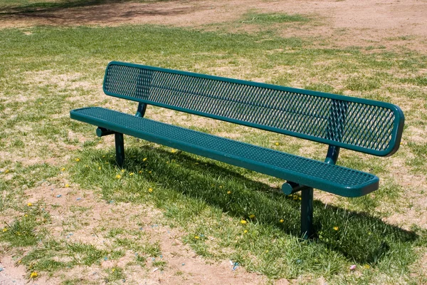 Deserted park bench — Stock Photo, Image