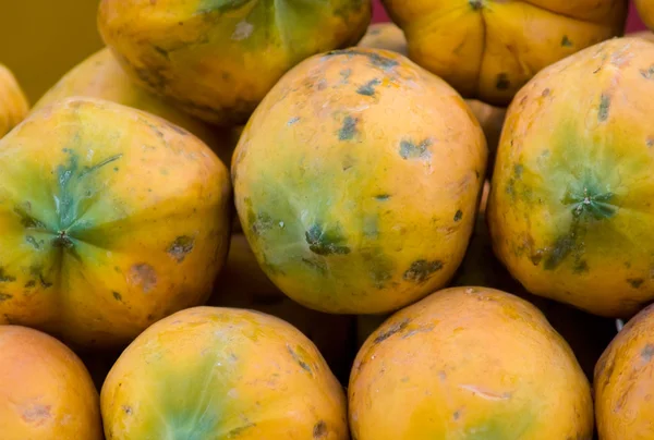 stock image Raw yellow papaya heap