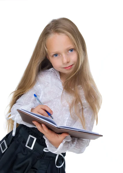 Menina escrevendo no branco — Fotografia de Stock