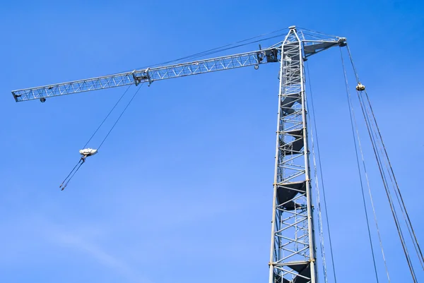 Large crane on blue sky background — Stock Photo, Image