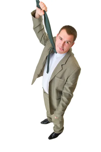 Businessman hanging by necktie — Stock Photo, Image