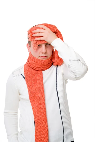 Sick young man holding his head — Stock Photo, Image