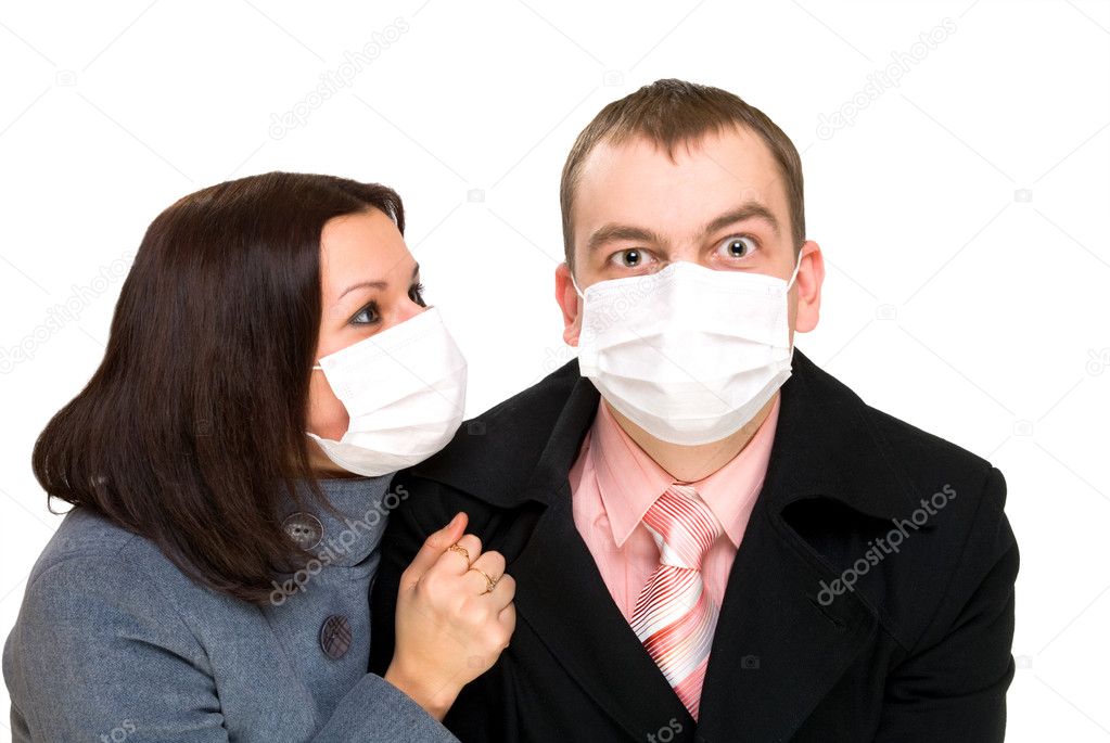 Afraid man and woman dressings mask