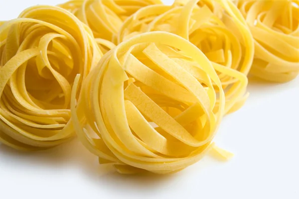 Högen av rå torr boet pasta — Stockfoto