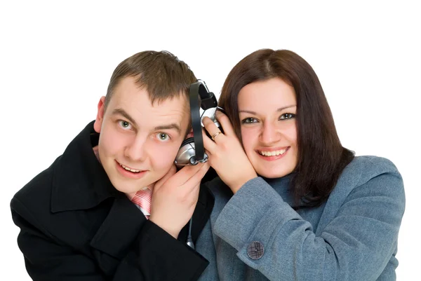 Muž a žena poslouchat sluchátka — Stock fotografie