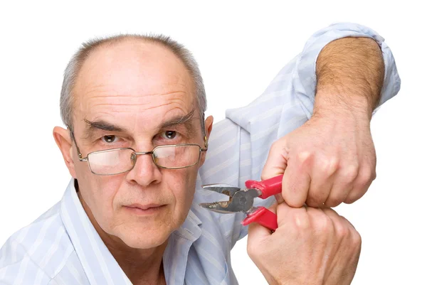 Serious man with pliers — Stock Photo, Image