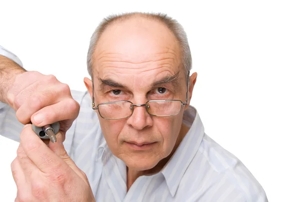 Серьезный человек в очках с отвёрткой — стоковое фото