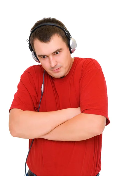 Poważny człowiek w słuchawkach — Zdjęcie stockowe