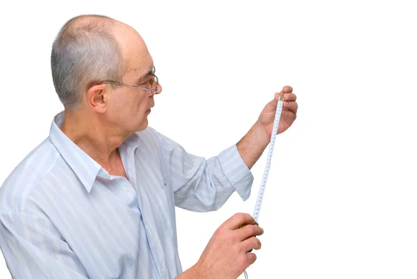 Homme mûr dans des lunettes avec ruban à mesurer — Photo