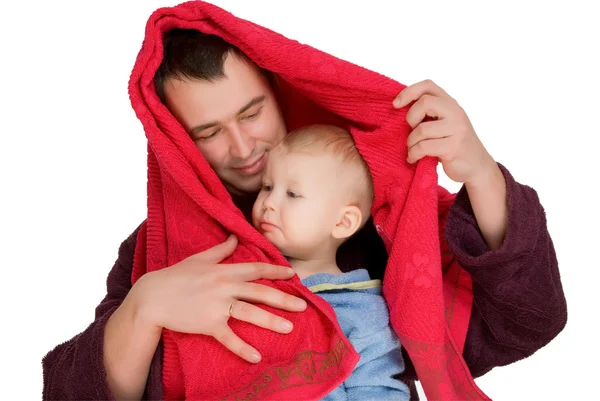 Jongen en man gekleed badjas — Stockfoto