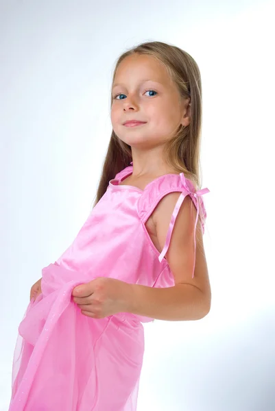 Blond girl in pink dress — Stock Photo, Image