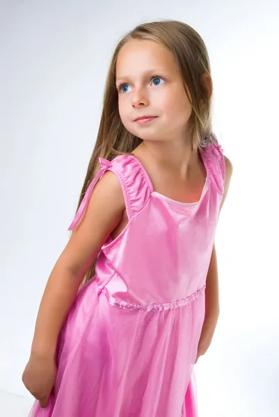 Blond girl stand in pink dress — Stock Photo, Image