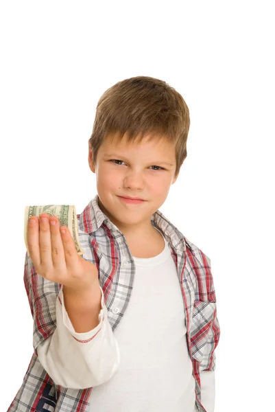 严重男孩与美元 免版税图库图片