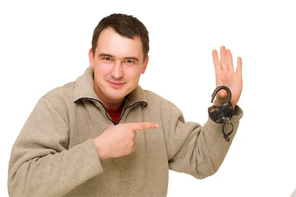 Man pointing to open lock — Stock Photo, Image