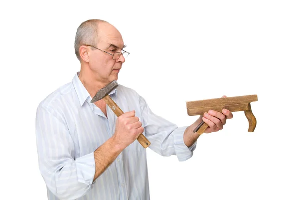 A man with a hammer and a plane — Stock Photo, Image