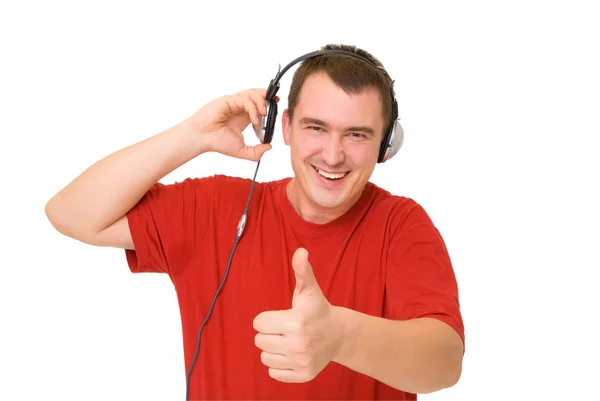 Sonríe hombre en los auriculares Imagen De Stock