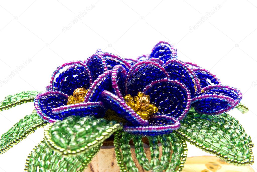 Blue beads flower with green leafs