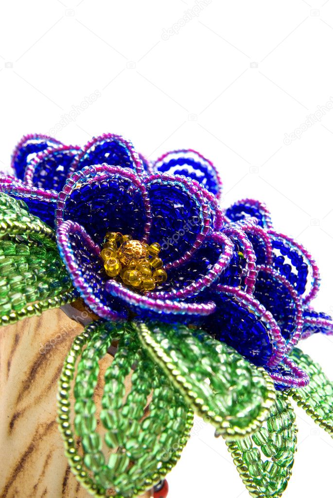 Blue beads flower with green leafs