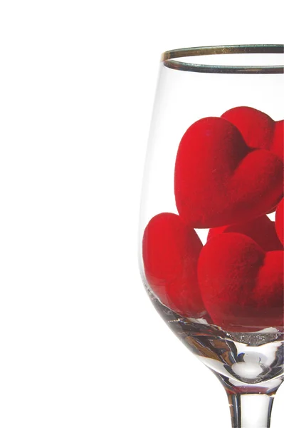 Corações em um copo de vinho — Fotografia de Stock