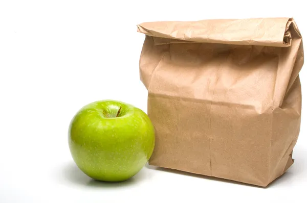 Τσάντα μεσημεριανό γεύμα και ένα μήλο — Φωτογραφία Αρχείου