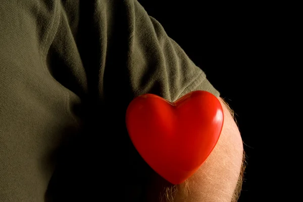 Srdce na rukávu — Stock fotografie