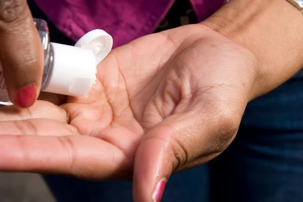Woman Applying Hand Sanitizer — Stock Photo, Image