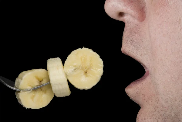 Jedzenie bananów — Zdjęcie stockowe