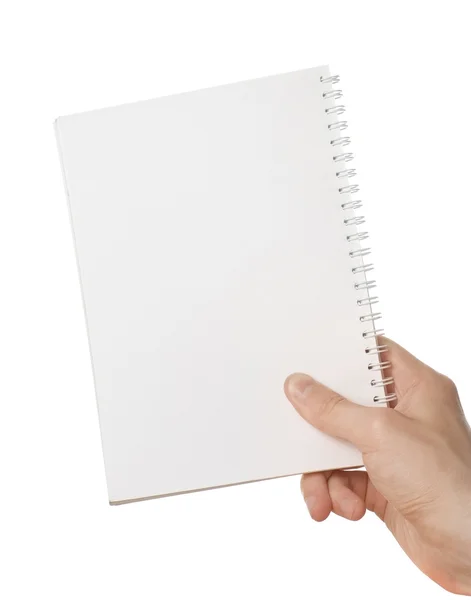 Mão segurando bloco de notas em branco — Fotografia de Stock